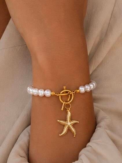 Parure collier et bracelet étoiles de mer blanc et doré – vue de dos