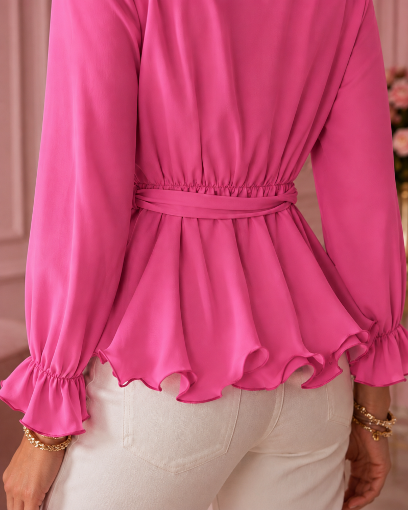 Blouse cache-cœur fuchsia à volants – détail du tissu