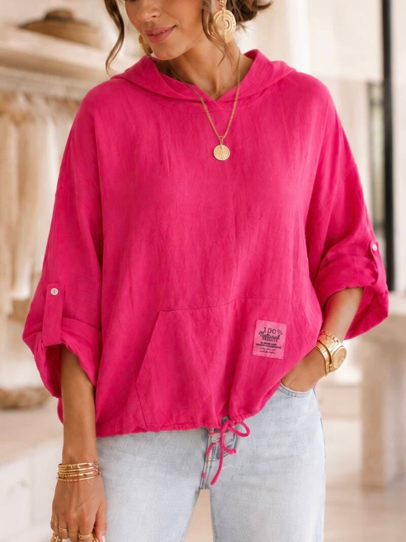 Haut oversize fuchsia à capuche en lin – détail du vêtement