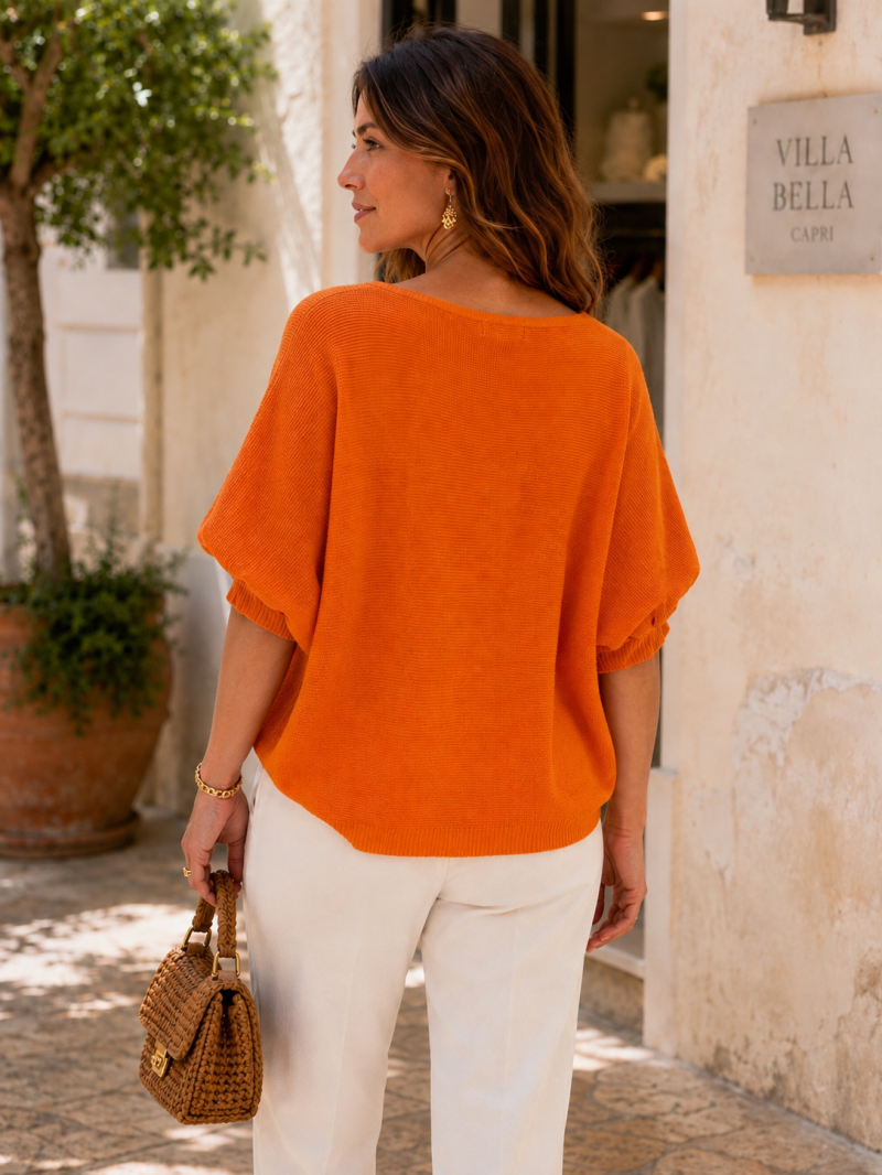 Pull léger orange à fleur 3D – vue de dos