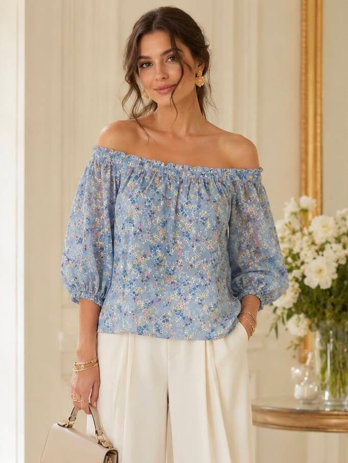 Blouse fleurie brodée bleu ciel col Bardot – vue de face