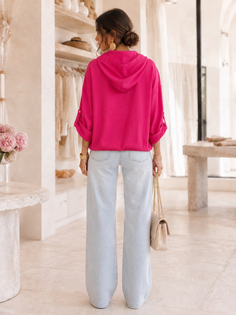 Haut oversize fuchsia à capuche en lin – détail de la finition