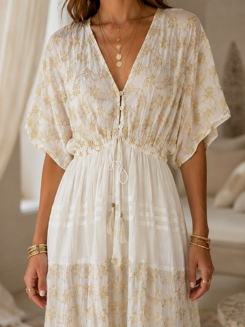 Robe longue blanche brodée dorée – vue de côté